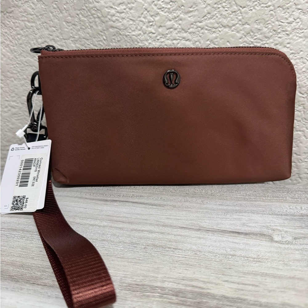 Lululemon- Curved Wristlet- Ancient Copper- OS